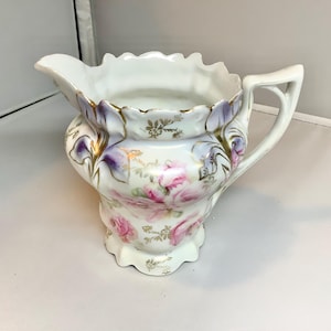 Beautiful RS Prussia colorful Lavender Iris and pink roses with Gold Creamer Excellent Condition.