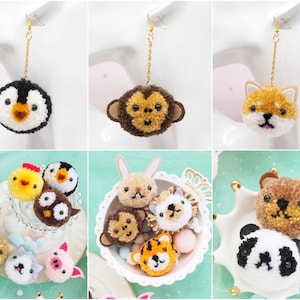 May include: A collection of colourful pom-pom animal earrings and charms. The earrings feature a penguin, monkey, and Shiba Inu. The charms include a chick, owl, bunny, lion, bear, panda, and tiger.