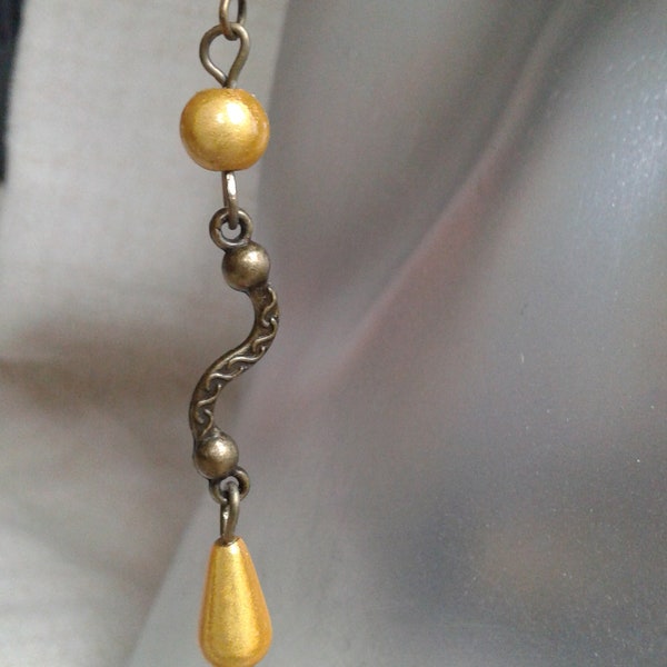 boucles d'oreilles "serpentin et perles jaunes"