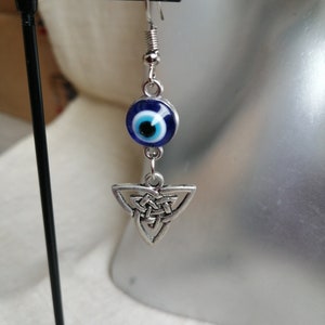 Creole earrings "Evil eye and triquetra"