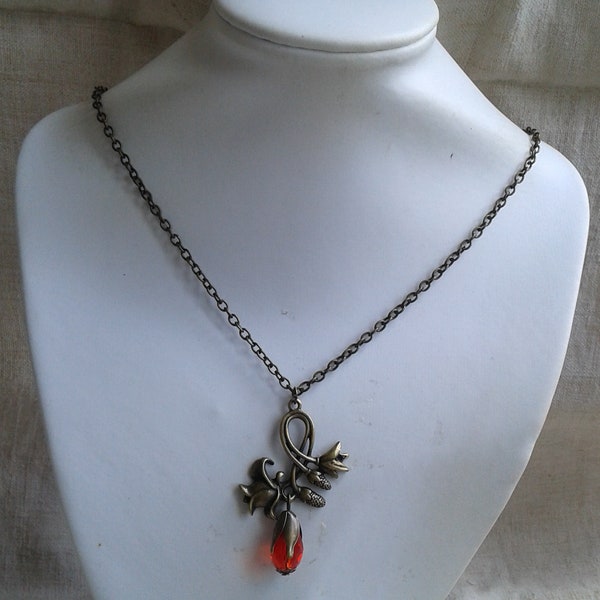 collier" fleur bronze et perle "