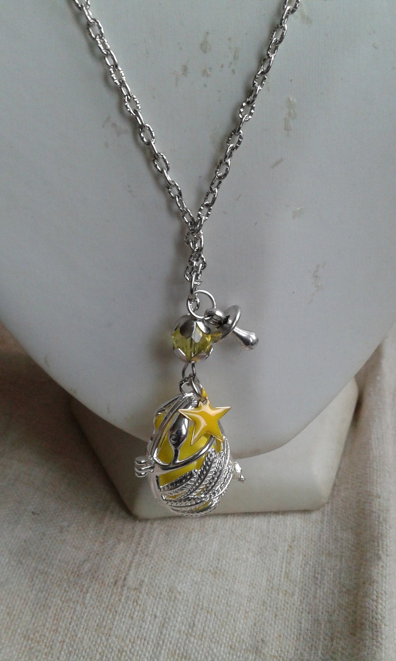 pregnancy bola necklace swan and yellow star