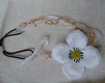 gold chain and white flower headband