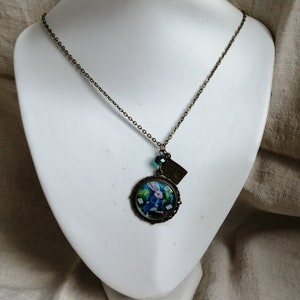 collier "lapin d'Alice aux pays des merveilles"