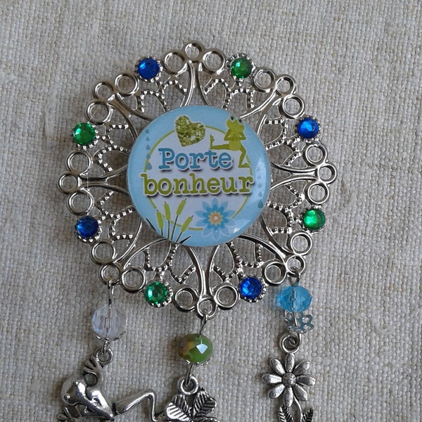 broche "porte bonheur"