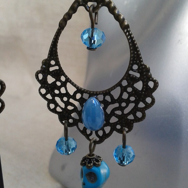 boucles d'oreilles clips "tête de mort bleue"