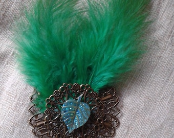 broche plumes vertes