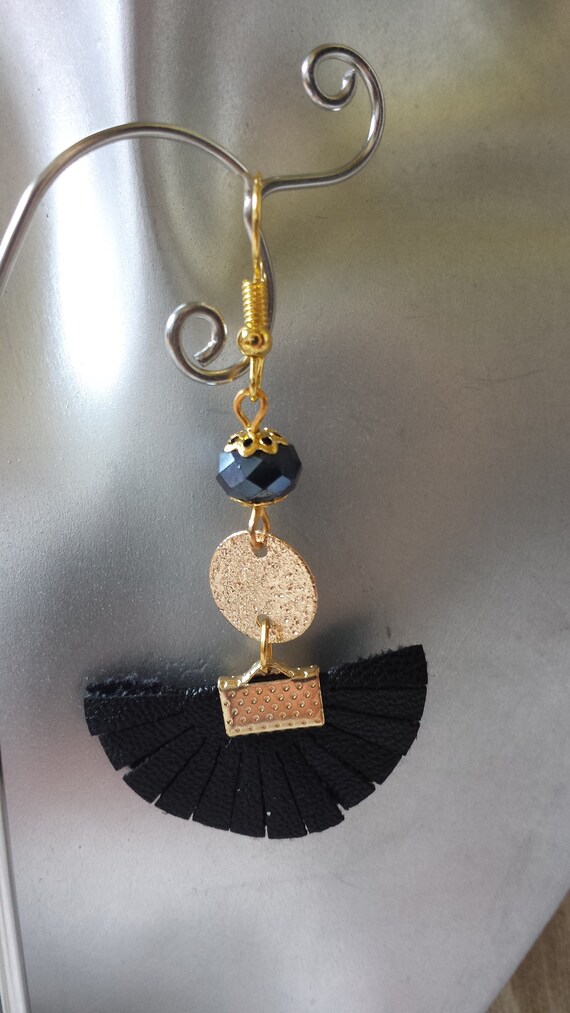 black fan earrings