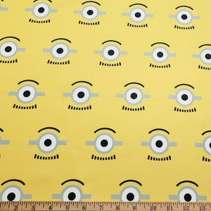 One Eyed Cartoon/Cartoon Eyes on Yellow Polyester Woven Knit Boardshort Fabric by the Yard