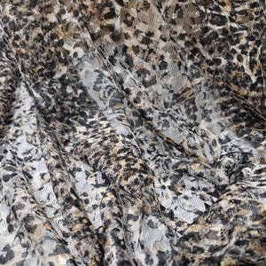 Animal Print Pattern Over a Flowery Base Non-Stretch Lace Fabric by the Yard