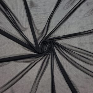 Malla elástica negra de nailon y licra transparente con elasticidad en 4 direcciones para trajes de baño, lencería, disfraces y prendas de vestir. Precio reducido a medida