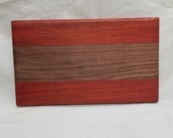 Padauk and walnut handmade cutting board.