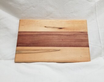 Maple and padauk handmade cutting board.