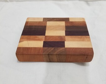 Handmade end grain wooden trivet.