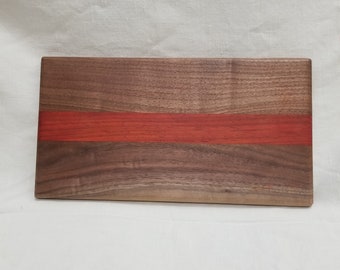 Walnut and padauk handmade cutting board.