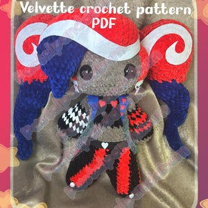 May include: A crocheted doll with a red, white, and blue color scheme. The doll has large, round eyes and is wearing a hat with the text "PDF". The doll's outfit includes a checkered pattern and heart accents. The text "Velvette crochet pattern" is at the top.