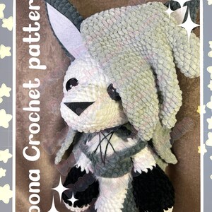 May include: A handmade crochet bunny doll in white, gray, and black. The bunny has long ears, a fluffy mane, and a detailed face. The text "Loona Crochet pattern" is visible on the left side of the image, and the text "Pastelpandabum" is at the bottom.
