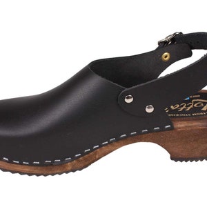 Slingback women's clogs black leather on brown wooden clogs base by Lotta from Stockholm