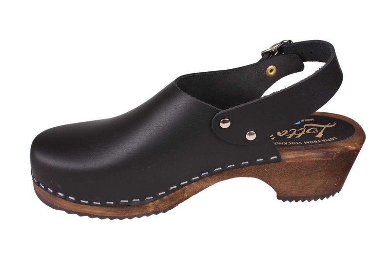 Slingback women's clogs black leather on brown wooden clogs base by Lotta from Stockholm