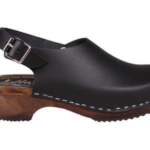 Slingback women's clogs black leather on brown wooden clogs base by Lotta from Stockholm