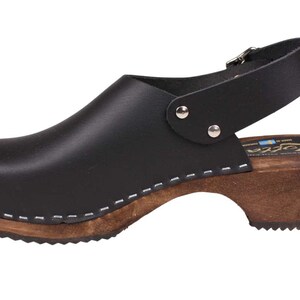Slingback women's clogs black leather on brown wooden clogs base by Lotta from Stockholm