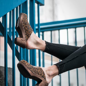 Leopard Print Womens High Heels Classic Clogs with brown wooden clogs base.