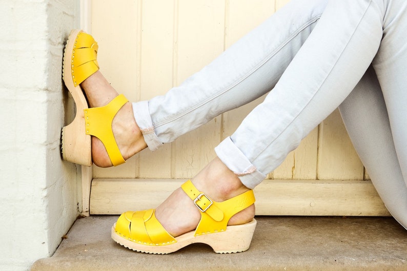 yellow swedish clogs