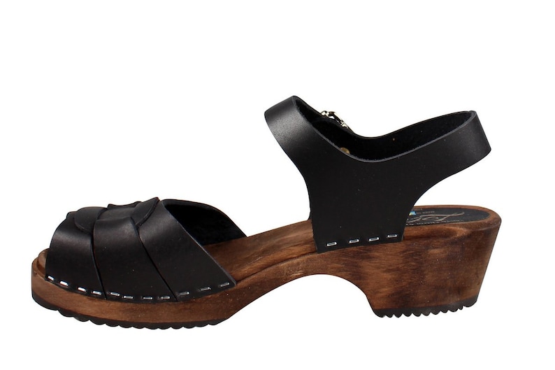 Swedish Clogs in black leather with wooden clogs base. Low heel open toed leather clogs  perfect summer sandals by Lotta from Stockholm.