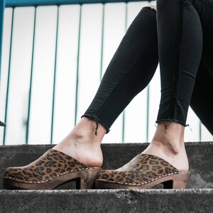 Leopard Print Womens High Heels Classic Clogs with brown wooden clogs base.