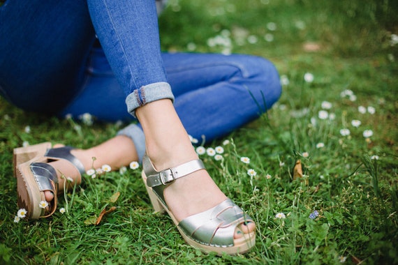 metallic silver clogs