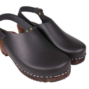 Slingback women's clogs black leather on brown wooden clogs base by Lotta from Stockholm