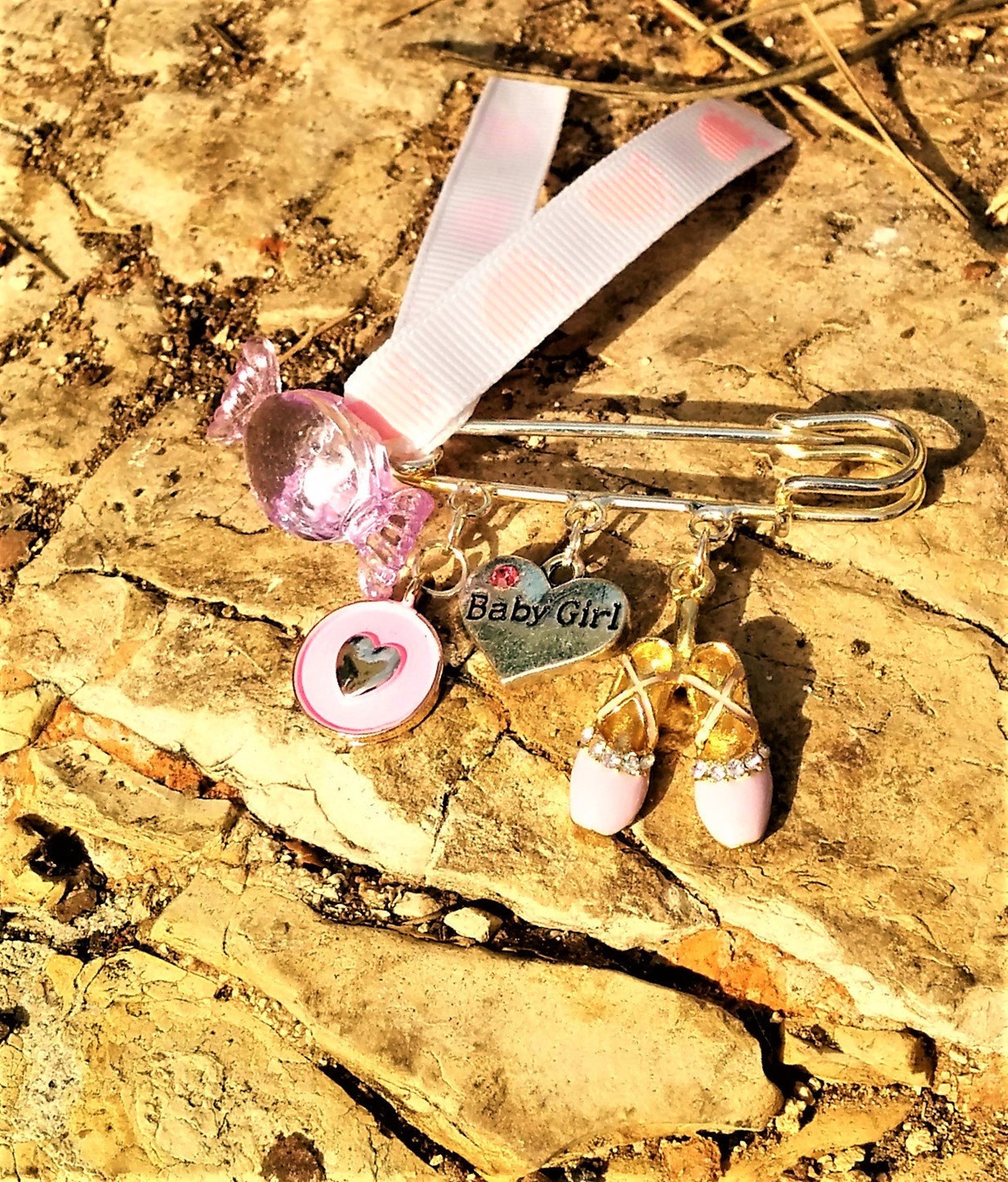 newborn/ baby girl/ new mom/ safety pin/ gift/ baptism/ baby shower/ ballet shoes/ evil eye/ charms/ heart/ candy bead/ footstep