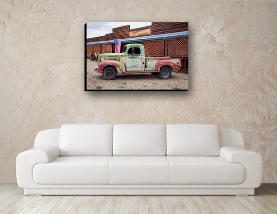 Old Rusty Classic Farm Truck and American Flag in Front of a