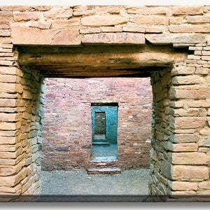 Ancient stone brown walls and doors at the Pueblo Bonito Ruin at Chaco Canyon, NM. Wall art photograph print on a gallery wrapped canvas. image 1