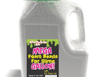 May include: A gallon-sized clear plastic container filled with white foam beads. The container has a green lid and a handle. The label reads "Smoothfoam Kids MEGA Foam Beads For Slime GALLON! with EZ Pour Lid". Made in the USA. www.slimeworks.com www.slimebeads.com Plasteel Corp Inkster, MI 48141 Foam Beads Gallon ITEM# RT-FBG