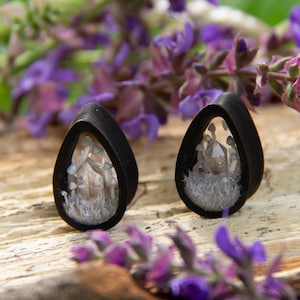 Mushroom gauges. Witch plugs. Dark plugs. Crystal plugs. Teardrop gauges. Clear quartz plugs