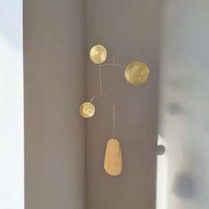 Kinetic brass and wood mobile. Modern minimalist hanging sculpture. Mid-century art decor