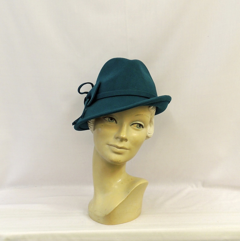 1930s Style Hats | Buy 30s Ladies Hats     Teal Vintage style 1930’s 1940’s inspired 100% Wool Felt Short Brim Tilt Trilby Hat $41.25 AT vintagedancer.com