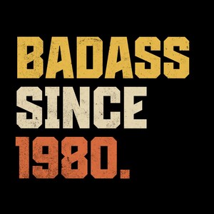 May include: A graphic design on a black background featuring the text BADASS SINCE 1980. The word BADASS is in yellow, SINCE is in off-white, and 1980 is in orange. Each word has a distressed, weathered texture in a bold, blocky font style.