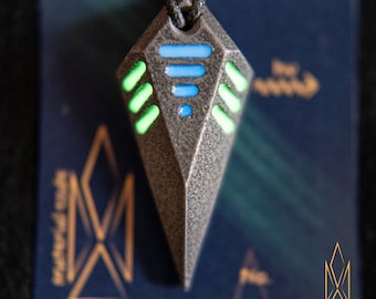 Spectre, codename "TMC Decade", glowing pendant crafted of titanium matrix composite, cyberpunk, sith, tron, futurism, cosmic, industrial