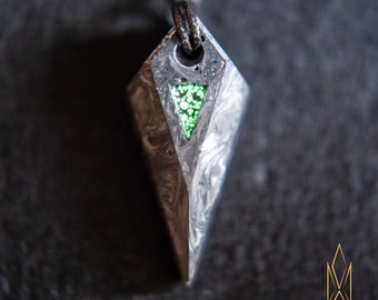 Forged Carbon fiber pendant with green glowing chunks, glow in the dark inclusions, sci-fi, futuristic, cosplay, tron, cyberpunk jewelry