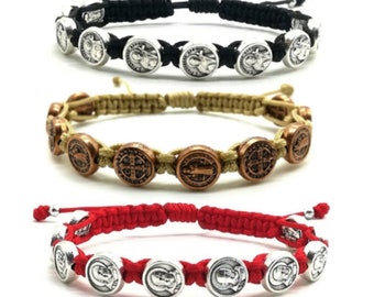 May include: Three braided bracelets with silver medallions featuring a religious image. The bracelets are available in black, tan, and red.