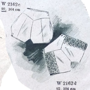 Puede incluir: Dos dibujos en blanco y negro de formas geométricas. Las formas están etiquetadas como "W 2162c 92, 104 cm" y "W 2162d 92, 104 cm".