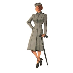 Peut inclure: Une femme en manteau gris et chapeau se tient debout, la main sur une canne. Elle porte des chaussures noires.