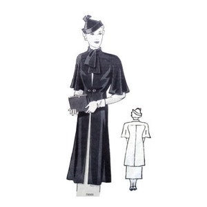 May include: A black long coat with a cape collar and a matching hat. The coat has a belt and a small pocket on the left side. The model is holding a small clutch purse.