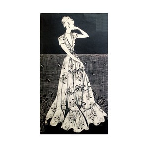 A 92cm/36" bust size vintage 1940s short sleeve front ruffle house coat / robe sewing pattern.