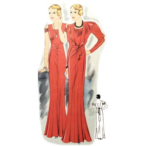 以下が含まれることがあります： 赤いロングスリーブのイブニングドレスを着た2人の女性。ドレスはフィットしたボディスと、流れるようなスカート、ウエストにサッシュが付いています。一人の女性は黒いネックレス、もう一人は銀色のペンダントネックレスをしています。