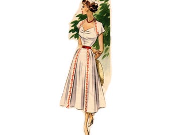 vintage 96 cm 38" taille de buste des années 1950 robe de jour/robe de cocktail avec mancherons courts et décolleté en coeur avec motif de couture de jupe plissée sur le devant.