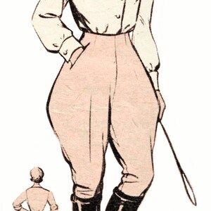 May include: A woman wearing a white button-down shirt with a light pink pair of riding breeches and black riding boots. She is holding a riding crop in her right hand.