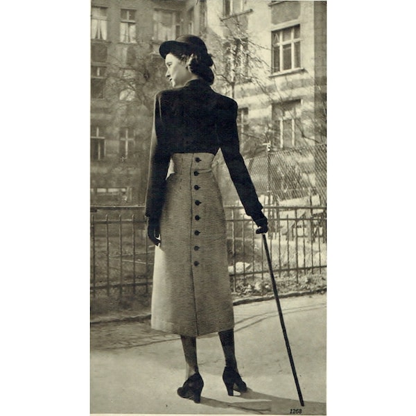Robe vintage des années 1940 avec un buste de 96 cm/38 po. avec une jupe taille haute, un haut à manches longues avec un motif de couture sur le devant de la veste boléro.